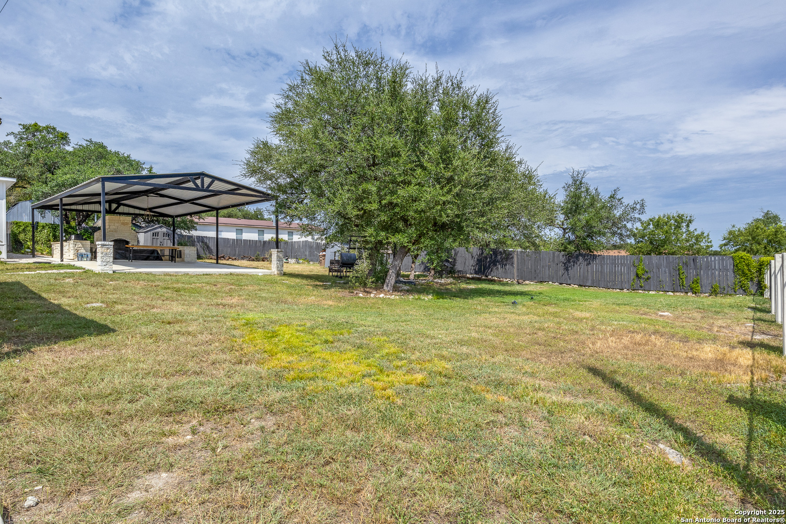 1071 Hidden Valley Drive Spring Branch, TX 78070 - Photo 24 of 30 a view of a house with a yard