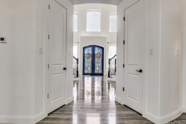 a view of entryway with wooden floor