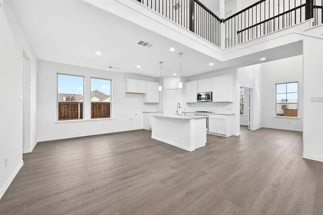 a view of kitchen with wooden floor