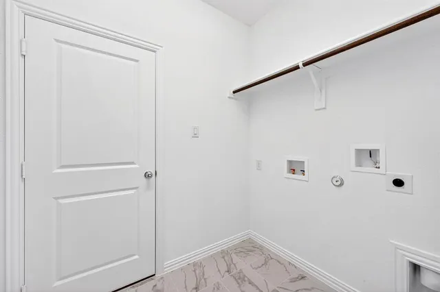 a view of small space with racks on the wall