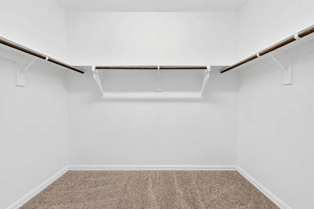 a view of small space with racks on the wall