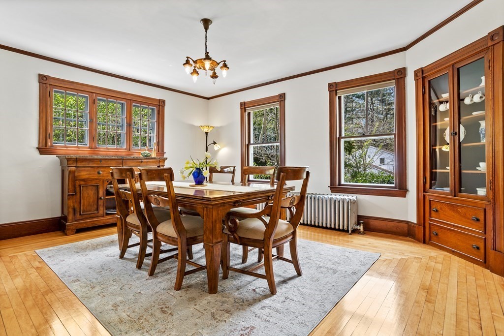 256 Great Road Stow, MA 01775 - Photo 15 of 42 a view of a dining room with furniture window and wooden floor