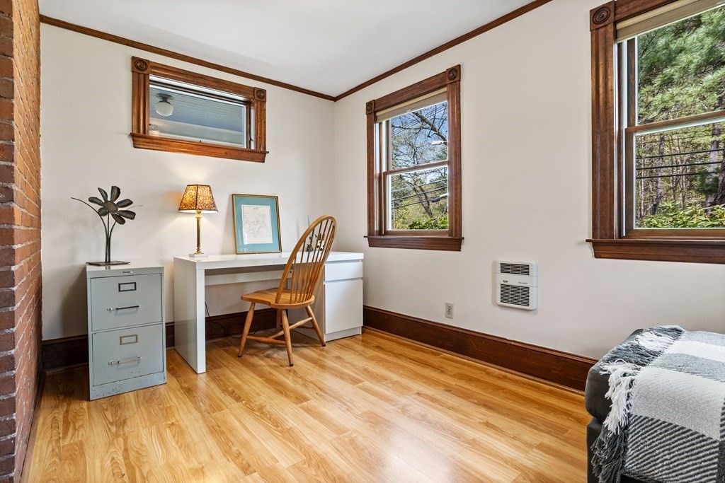 256 Great Road Stow, MA 01775 - Photo 23 of 42 a bed room with a bed and a desk