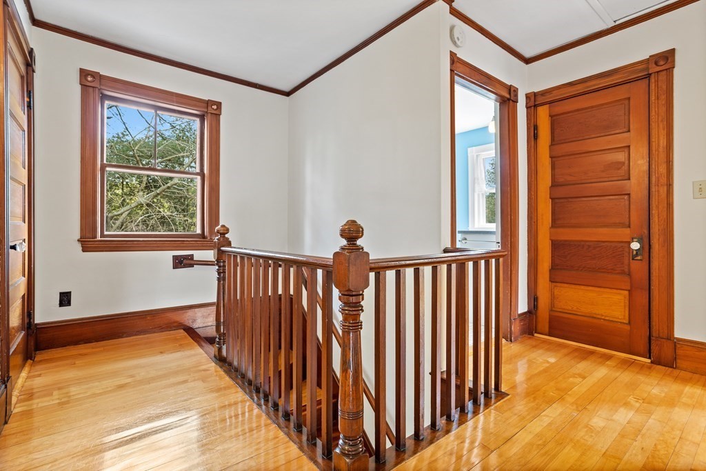256 Great Road Stow, MA 01775 - Photo 24 of 42 a view of a room with wooden floor and windows
