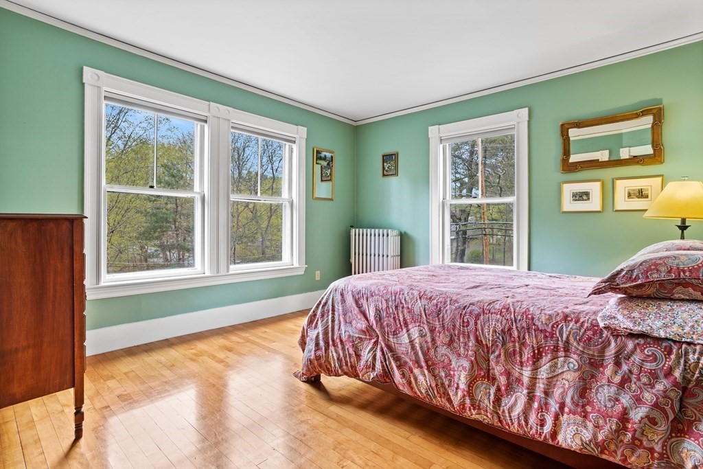 256 Great Road Stow, MA 01775 - Photo 29 of 42 a bedroom with a bed and a window