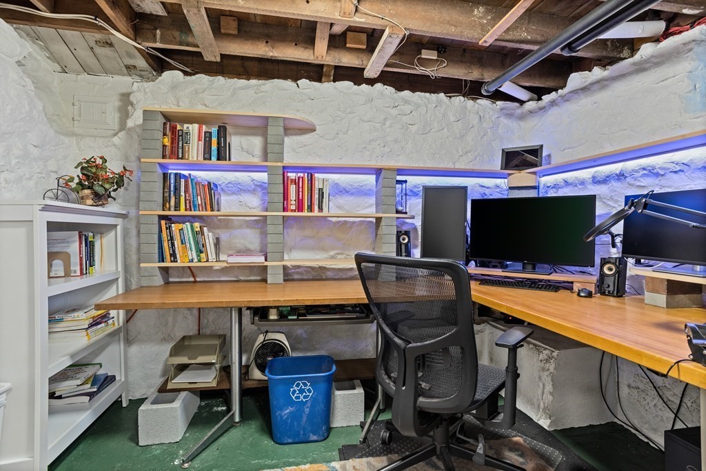 256 Great Road Stow, MA 01775 - Photo 31 of 42 a room with furniture and a flat screen tv