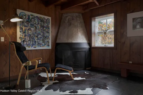 a bathroom with a sink toilet and a mirror