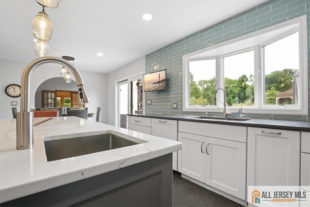 167 Federal Road Monroe Township, NJ 08831 - Photo 12 of 46 a kitchen with a sink and a large window