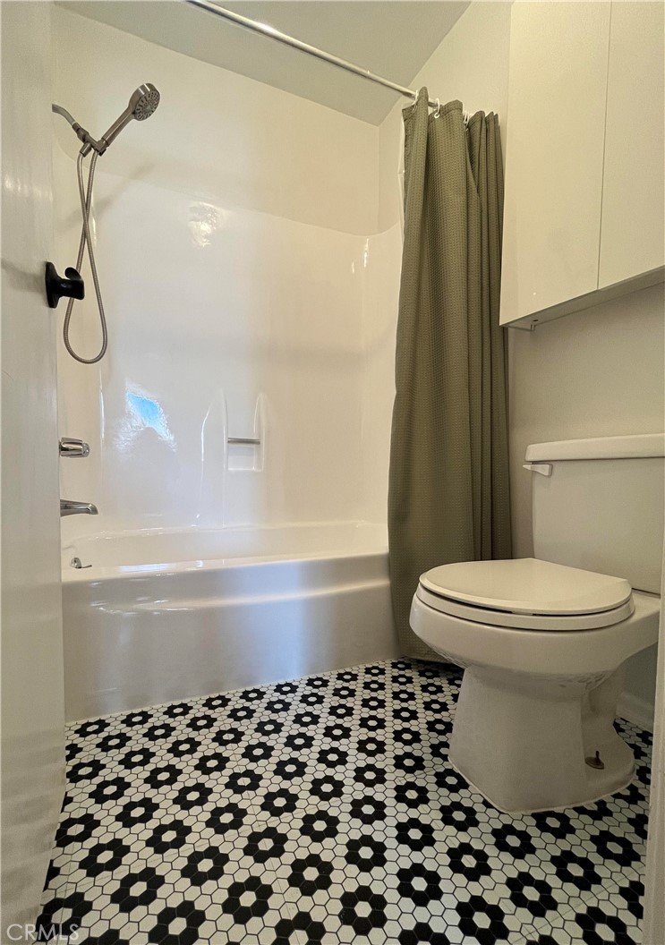 8740 Tuscany Avenue Playa del Rey, CA 90293 - Photo 15 of 21 a bathroom with a toilet and a shower