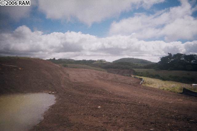 0 Awalau Road, Unit LOT 16 TOP OF AWALAU ROAD Haiku, HI 96708 - Photo 3 of 10 a view of a lake with mountain in back