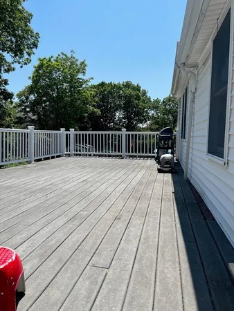 a view of balcony with a deck