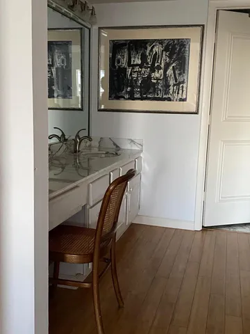 a view of a livingroom with wooden floor