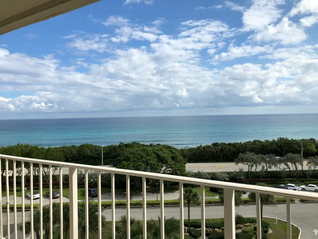 a view of city with green space