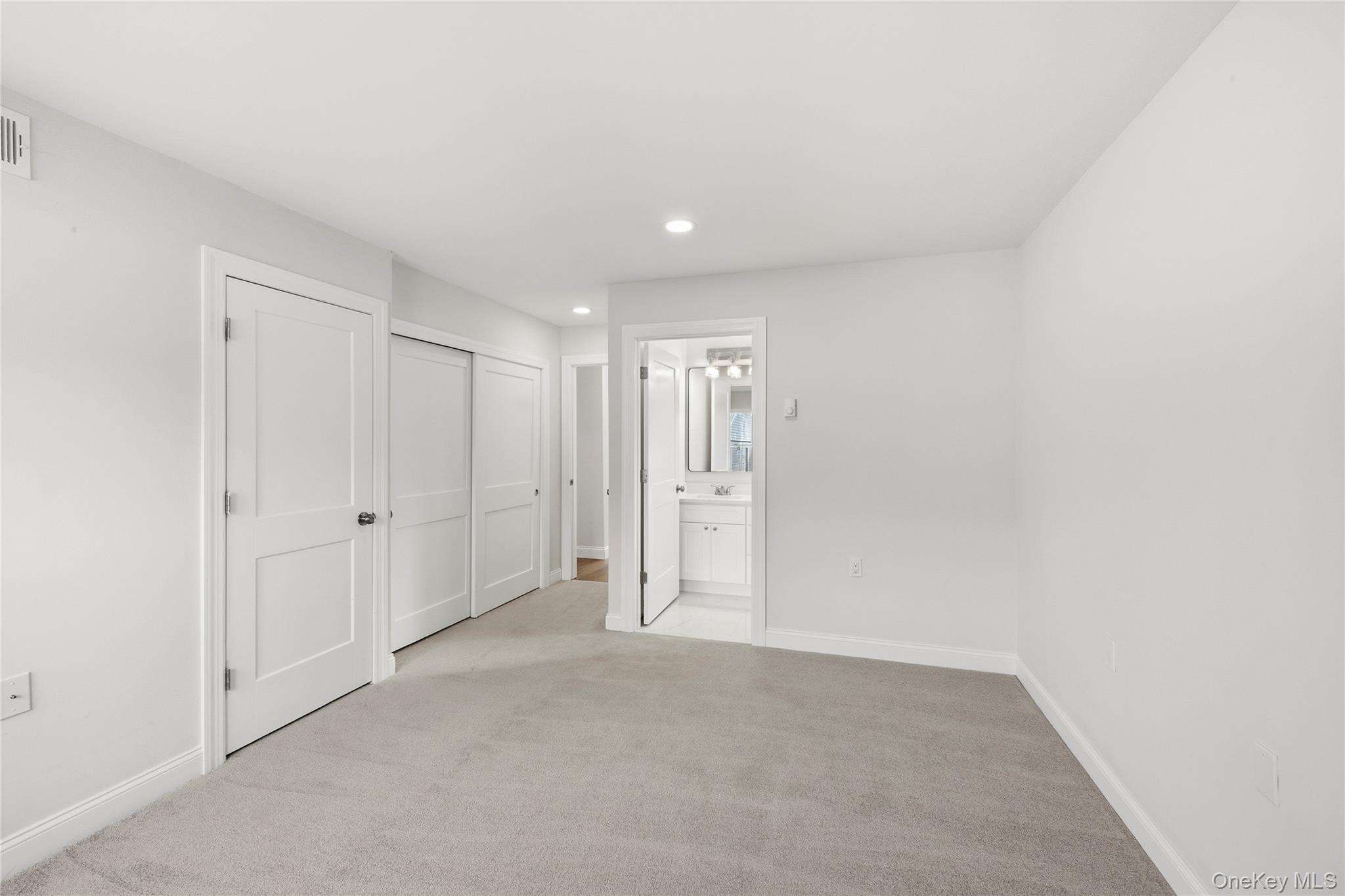 145 Edinburgh Drive Ridge, NY 11961 - Photo 10 of 13 a view of an empty room