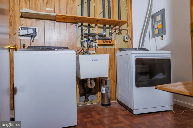 a utility room with dryer and washer