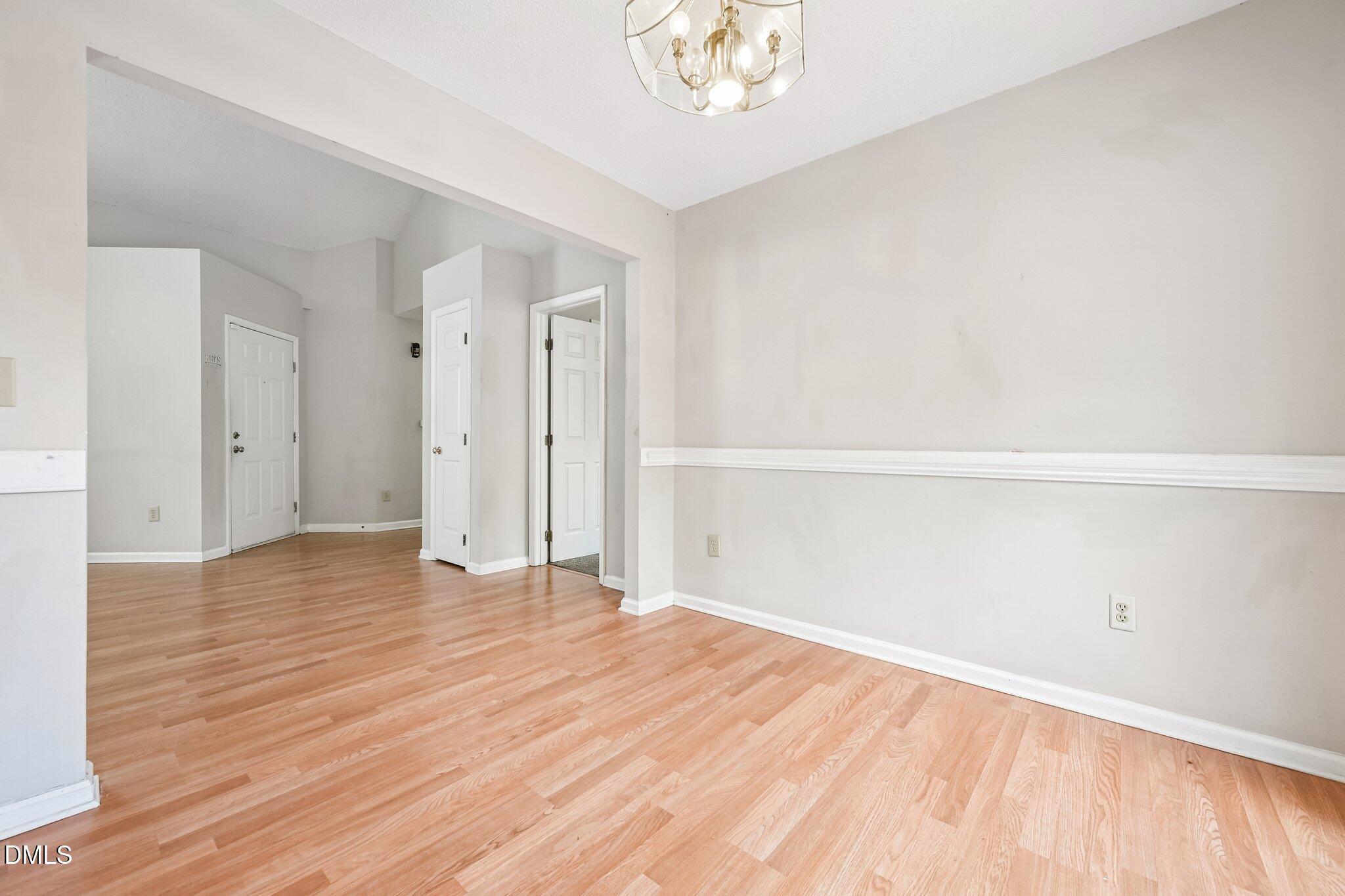 2800 West Jameson Road Raleigh, NC 27604 - Photo 8 of 24 a view of an empty room and wooden floor