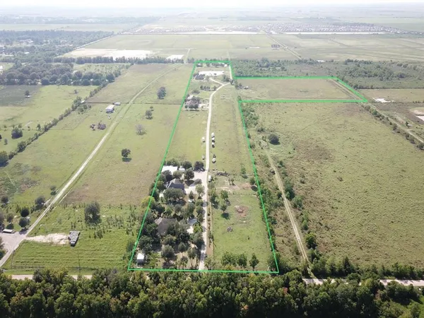 a view of a lake with a big yard