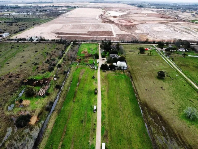 a view of a street with a houses