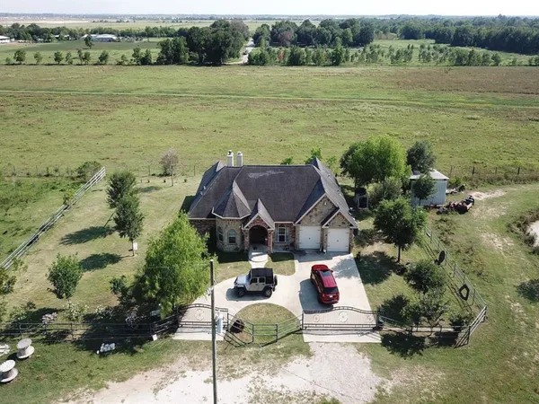 a view of a lake with a yard