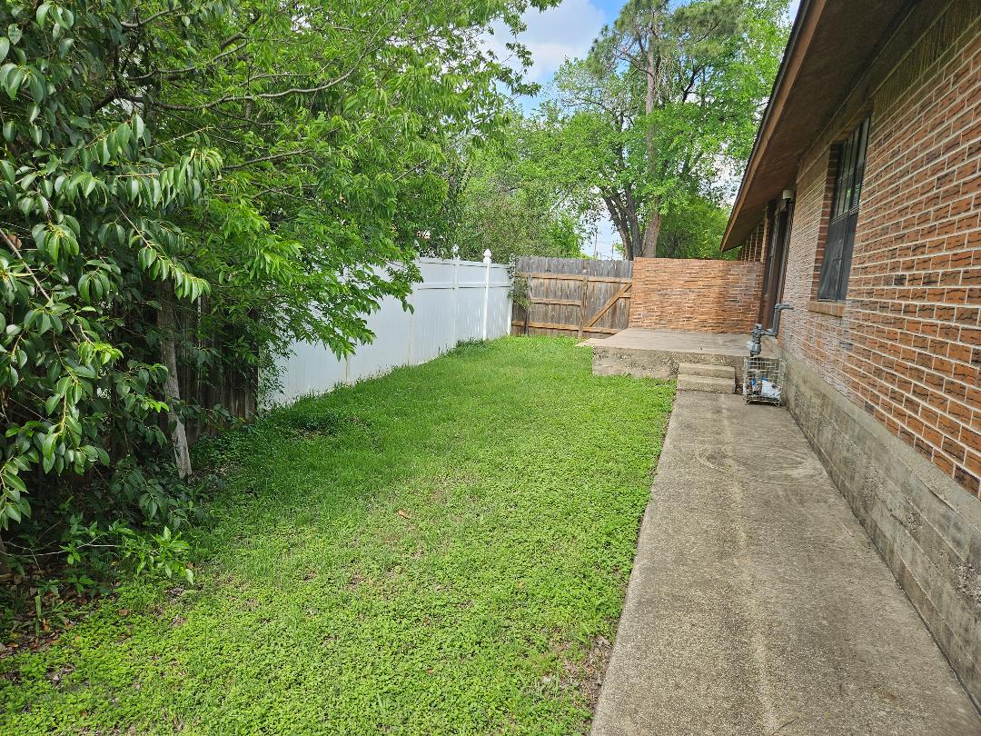 16 North Ave A, Unit B Elgin, TX 78621 - Photo 15 of 17 Side yard