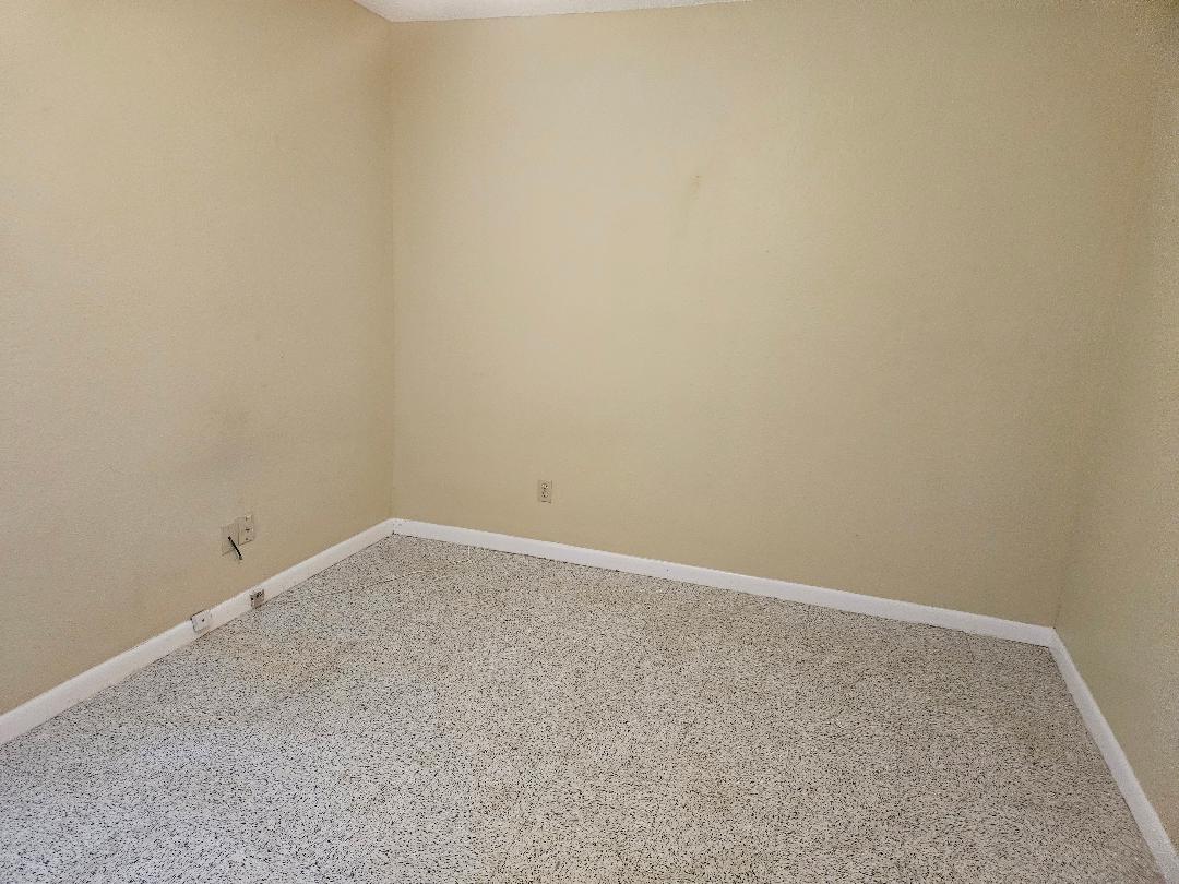 16 North Ave A, Unit B Elgin, TX 78621 - Photo 10 of 17 Second bedroom