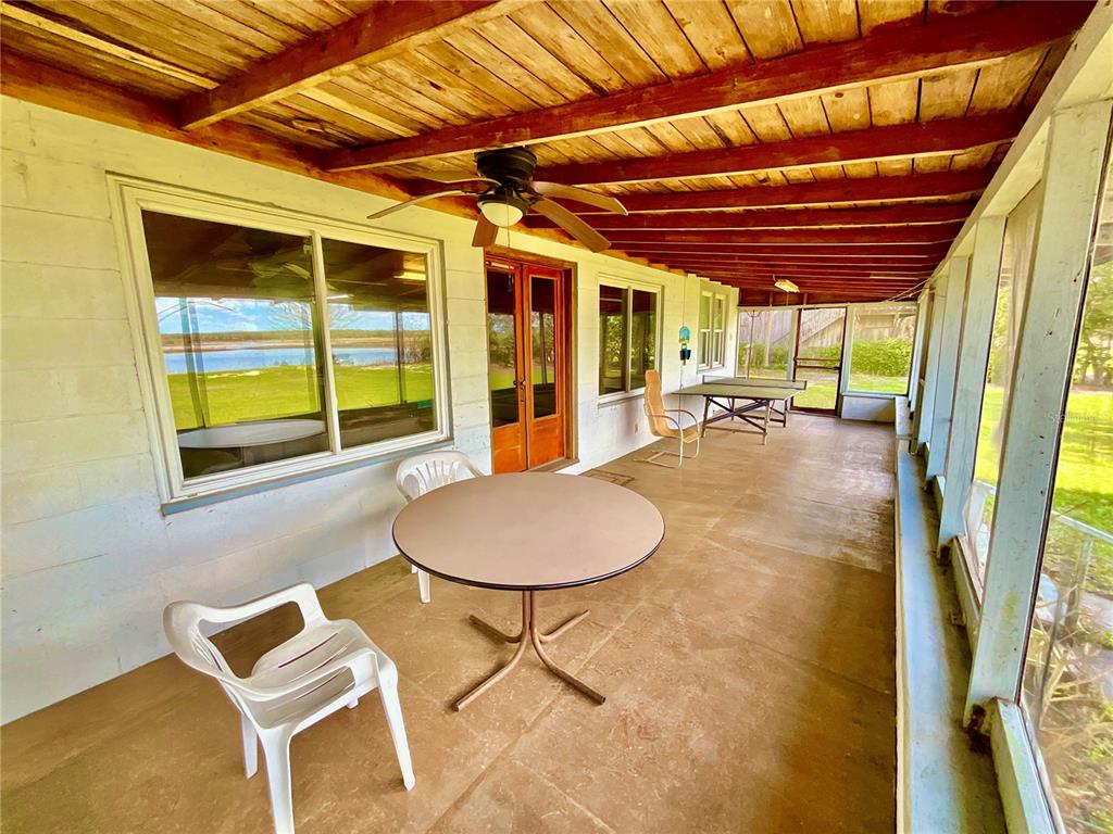 106 Sunny Side Beach Road Hawthorne, FL 32640 - Photo 35 of 54 a room with furniture and a window