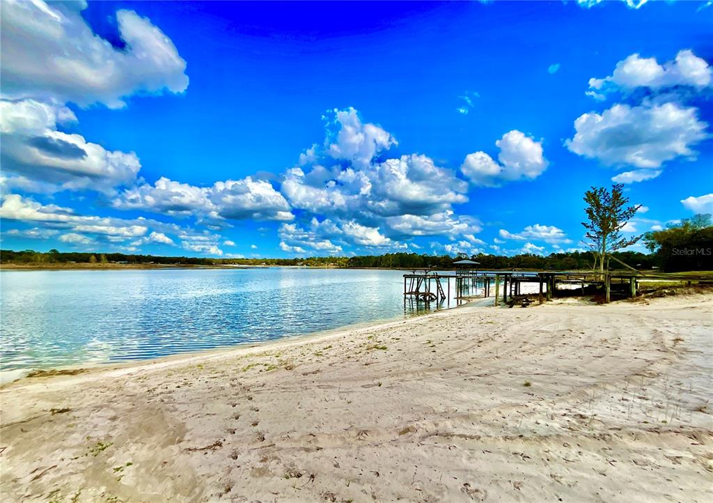 106 Sunny Side Beach Road Hawthorne, FL 32640 - Photo 41 of 54 a view of a lake with a beach