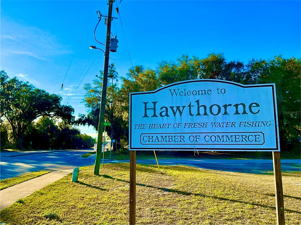 106 Sunny Side Beach Road Hawthorne, FL 32640 - Photo 46 of 54 a sign on the side of a building
