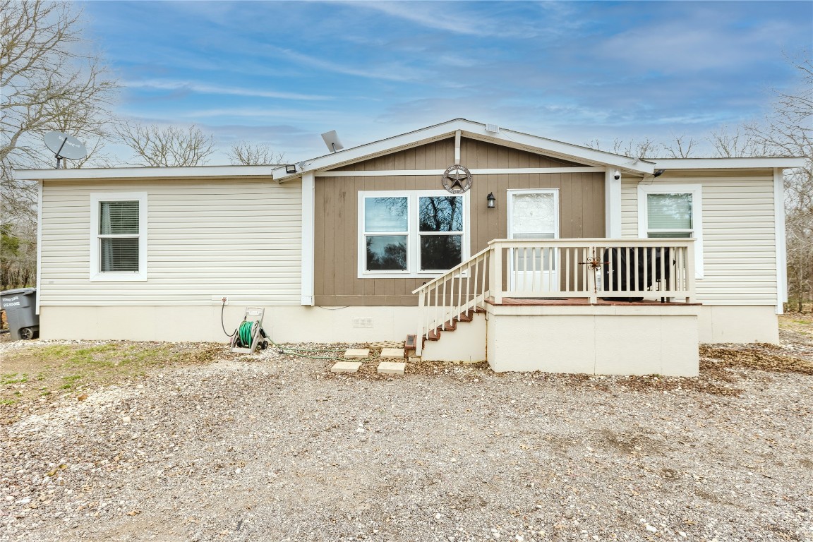 400 St Johns Road Dale, TX 78616 - Photo 12 of 17 View of front of property featuring a wooden deck and crawl space