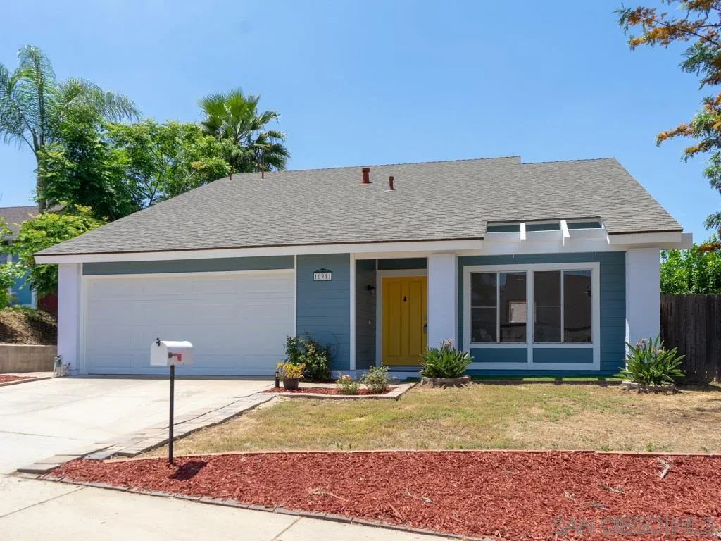 10911 Eddington Road Santee, CA 92071 - Photo 1 of 25 a front view of a house with garden