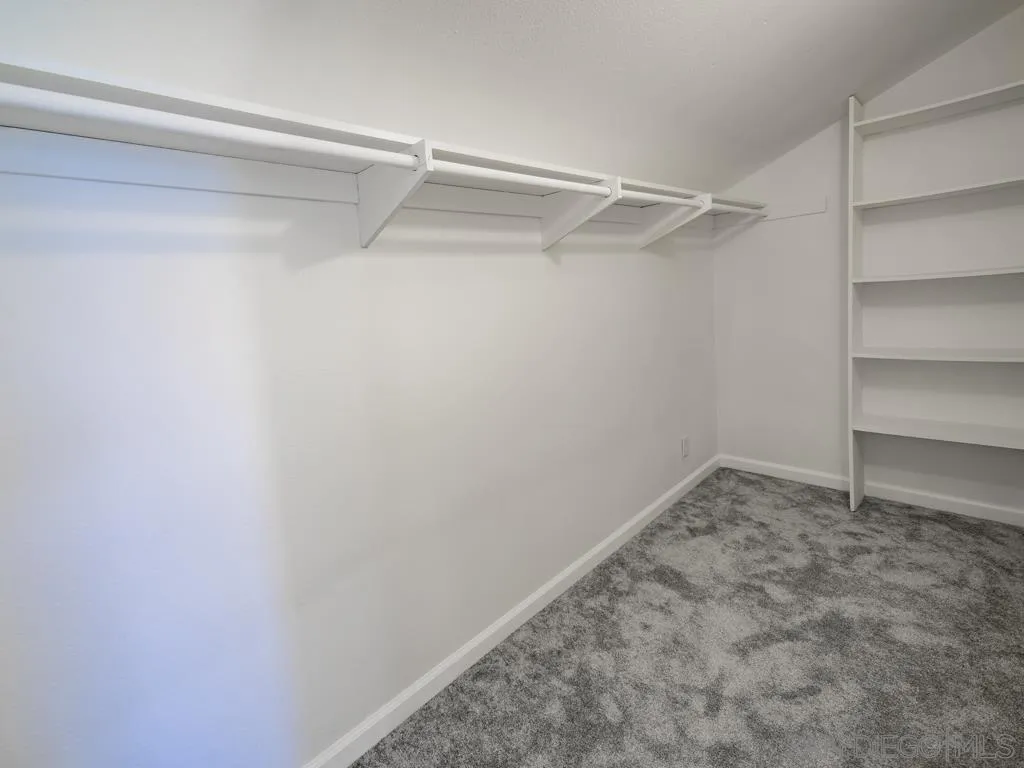 10911 Eddington Road Santee, CA 92071 - Photo 19 of 25 a view of an empty walk in closet