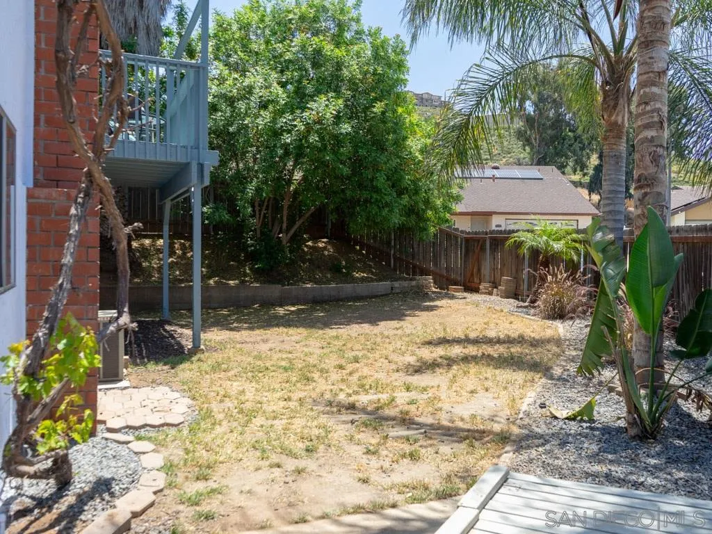 10911 Eddington Road Santee, CA 92071 - Photo 22 of 25 a view of a chairs and table in front of house