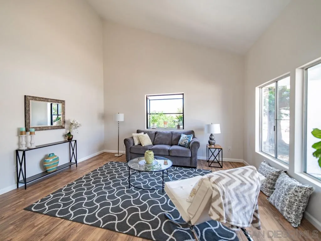 10911 Eddington Road Santee, CA 92071 - Photo 3 of 25 a living room with furniture lamp and window