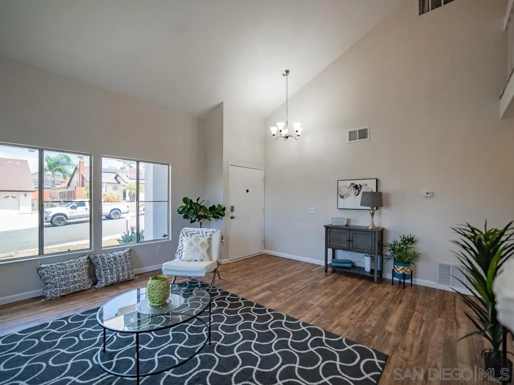 10911 Eddington Road Santee, CA 92071 - Photo 4 of 25 a living room with furniture and window