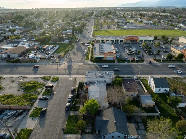 an aerial view of a house with outdoor space