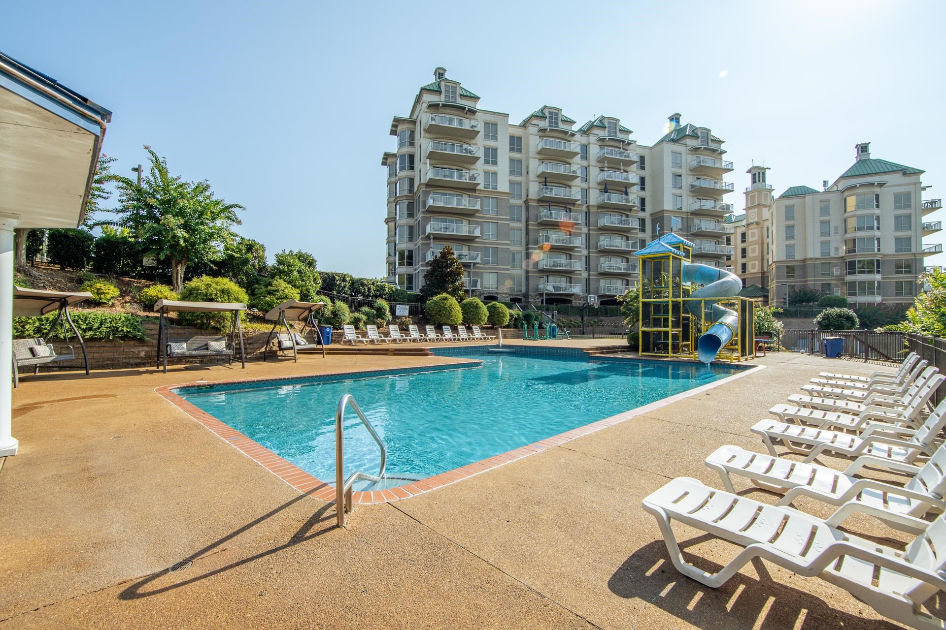 323 Cr 380 Road, Unit P604 Iuka, MS 38852 - Photo 26 of 38 a view of swimming pool with outdoor seating and city view