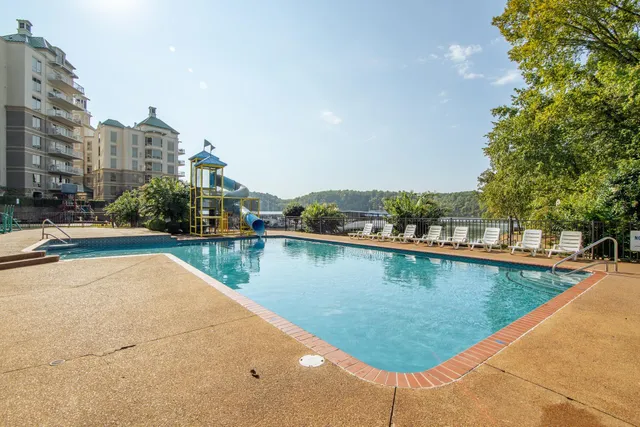 a view of a lake with a yard