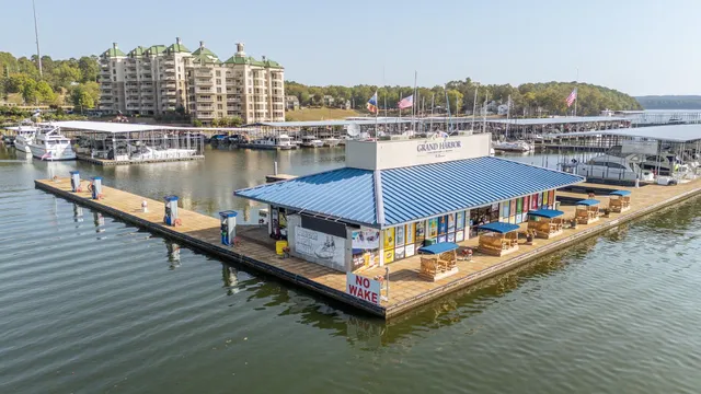 a view of a roof deck with outdoor seating and city view