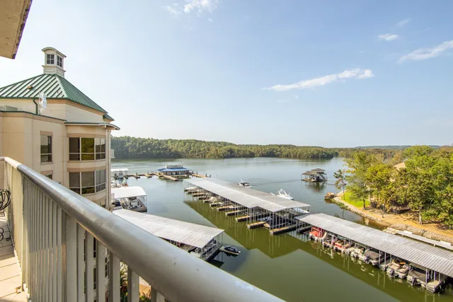 a view of a balcony with lake view and a ocean view