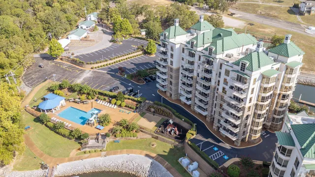 an aerial view of a house with a ocean view
