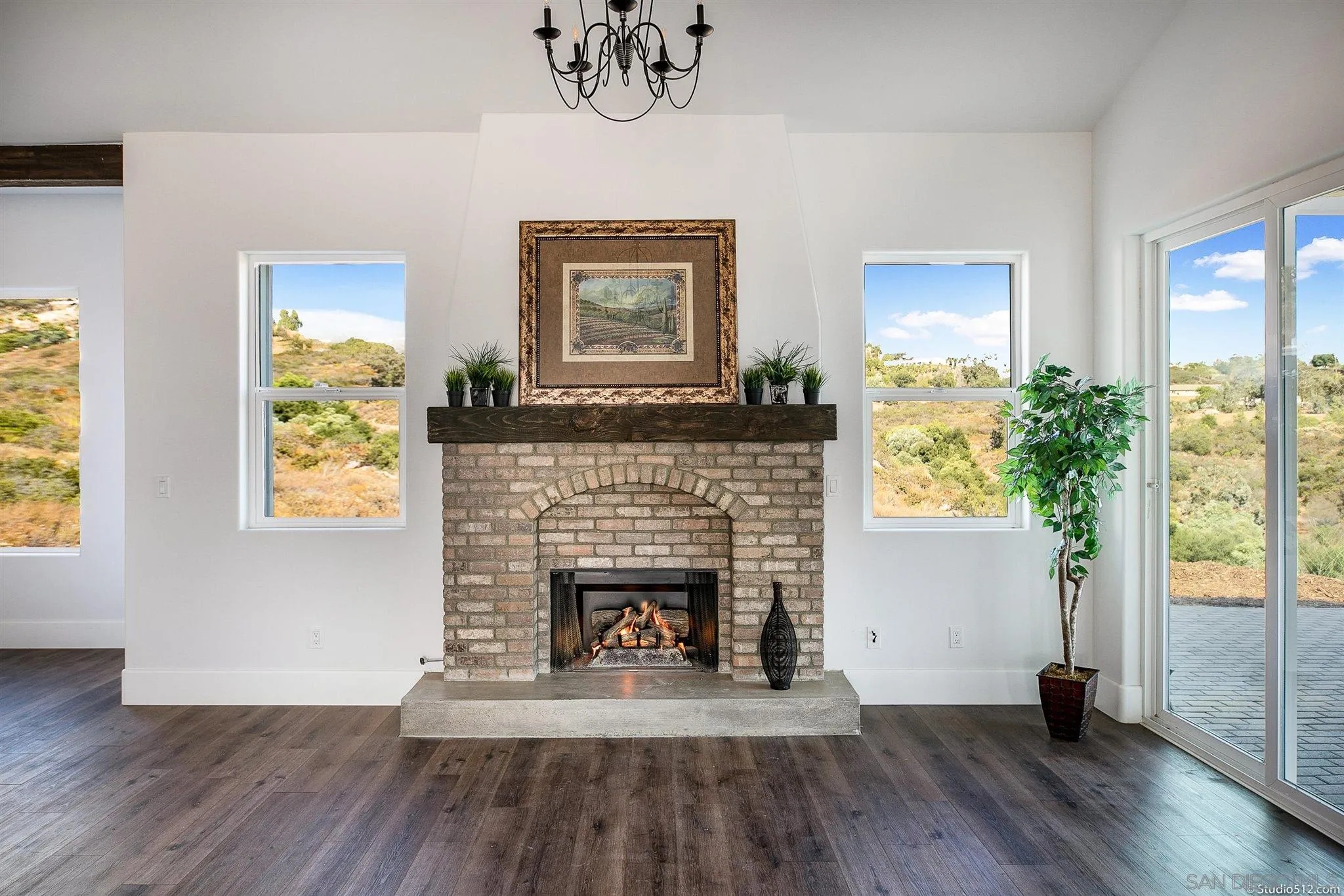 28661 Double K Road Valley Center, CA 92082 - Photo 9 of 34 a living room with furniture and a fireplace