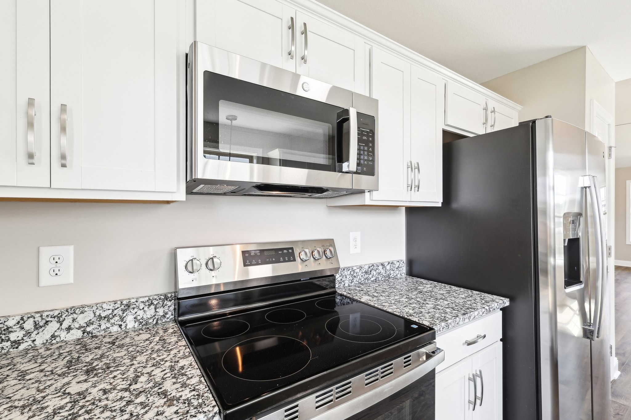 21 Echo Ridge Oak Grove, KY 42240 - Photo 11 of 51 a kitchen with stainless steel appliances granite countertop a stove microwave and refrigerator