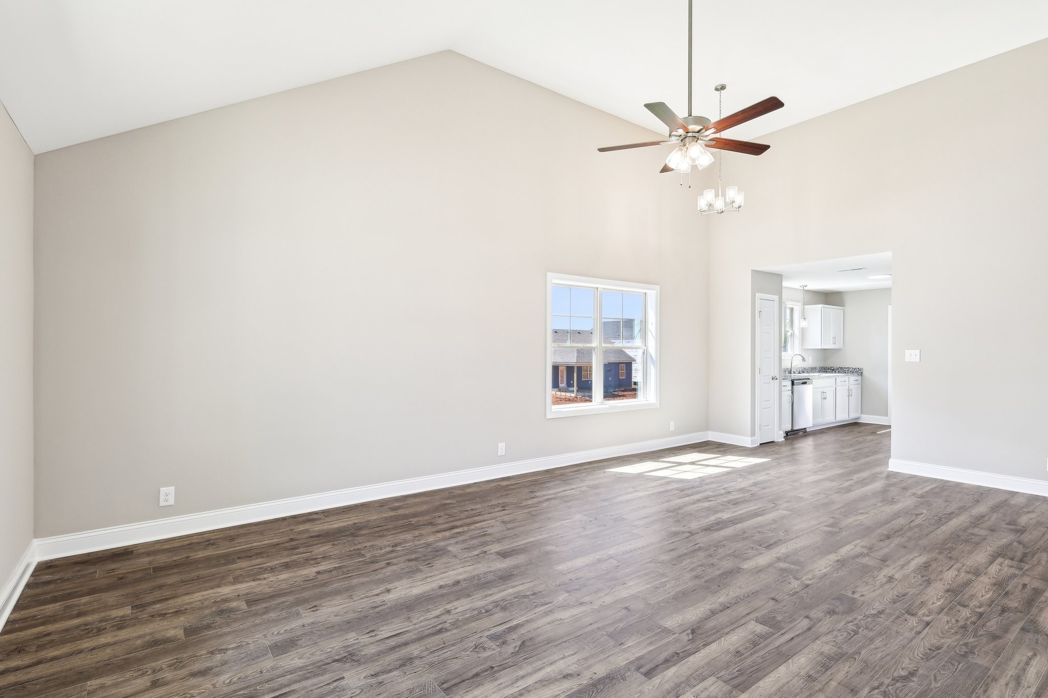 21 Echo Ridge Oak Grove, KY 42240 - Photo 5 of 51 an empty room with wooden floor fan and windows