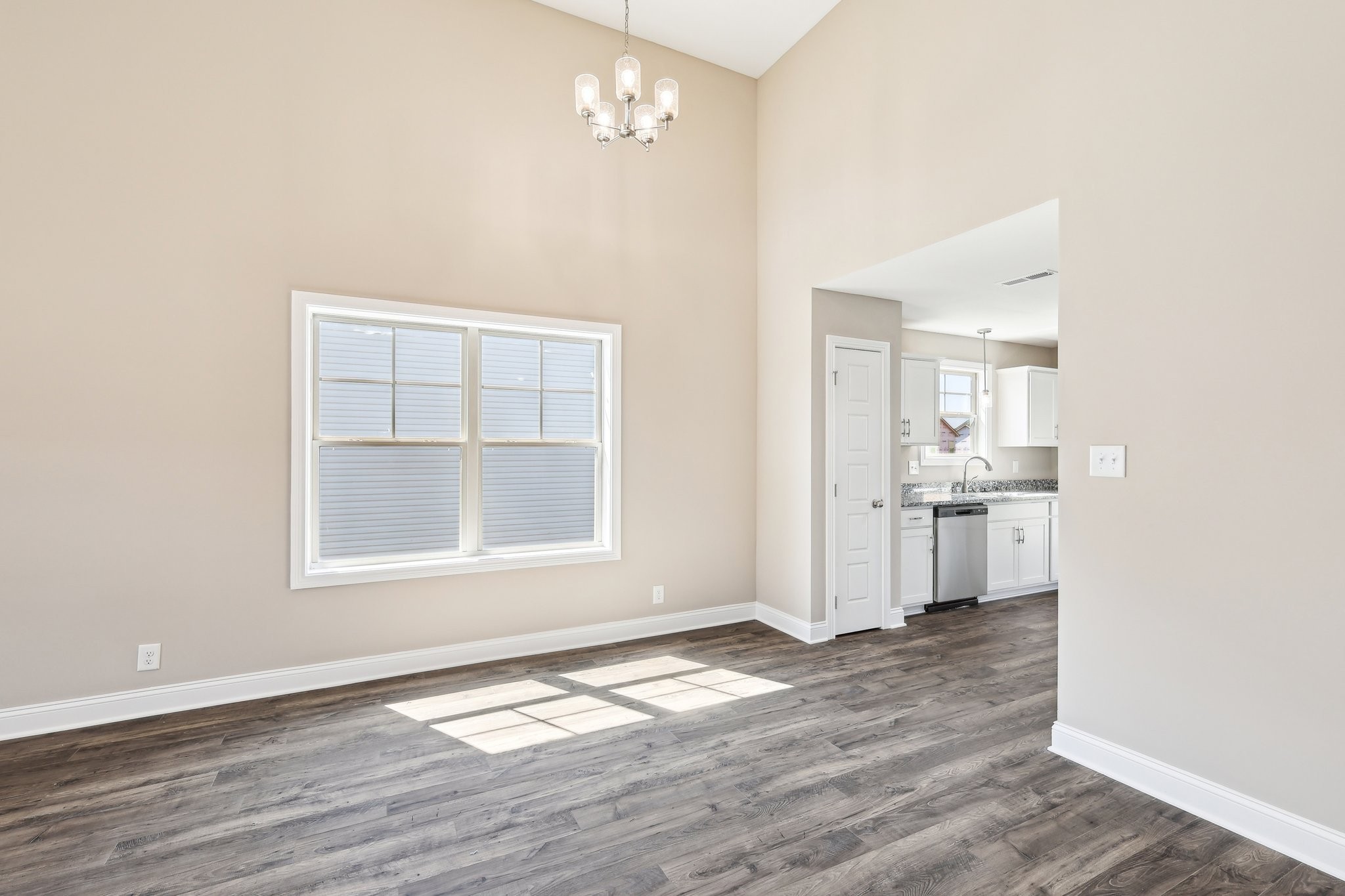 21 Echo Ridge Oak Grove, KY 42240 - Photo 7 of 51 an empty room with wooden floor and windows