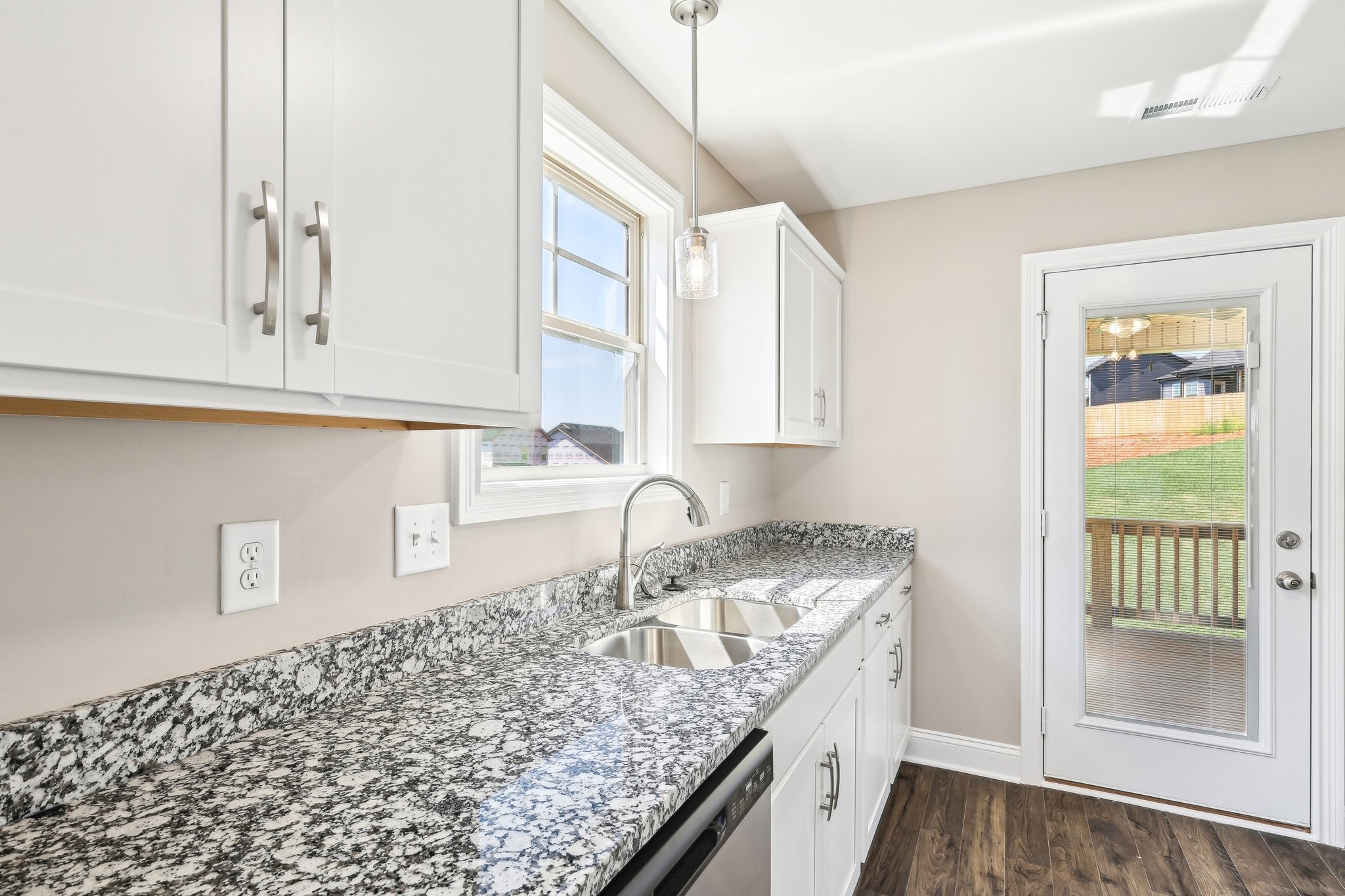 21 Echo Ridge Oak Grove, KY 42240 - Photo 9 of 51 a kitchen with granite countertop a sink and a window