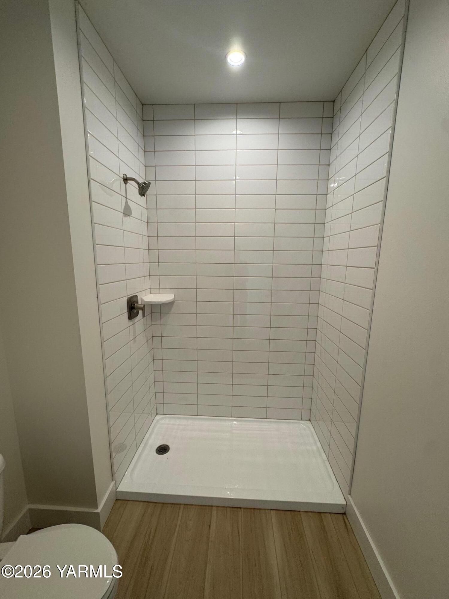 304 6th Street Zillah, WA 98953 - Photo 22 of 29 a bathroom with a shower