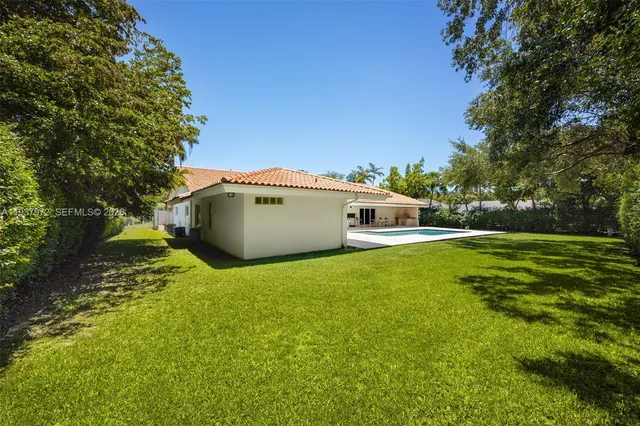 a house view with a garden space