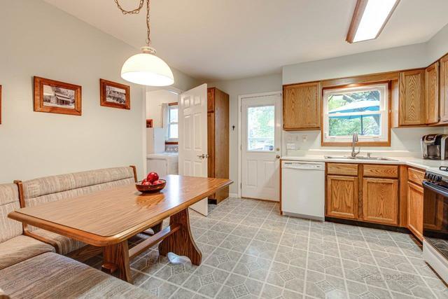 361 Cherry Valley Road Vernon Hills, IL 60061 - Photo 3 of 15 a kitchen with a stove a sink dishwasher and a refrigerator
