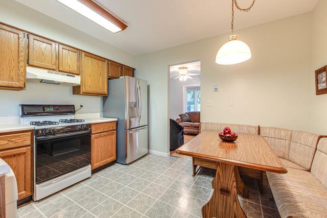 361 Cherry Valley Road Vernon Hills, IL 60061 - Photo 4 of 15 a kitchen with stainless steel appliances a stove a sink cabinets and a refrigerator