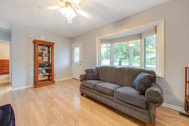 361 Cherry Valley Road Vernon Hills, IL 60061 - Photo 5 of 15 a living room with furniture and a window